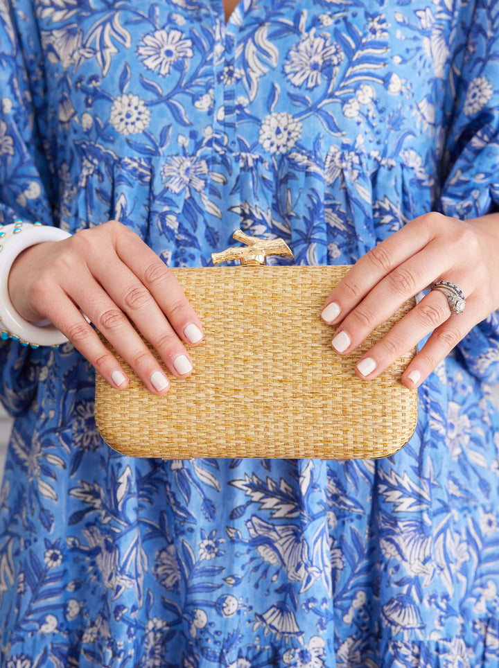 Coral Woven Clutch